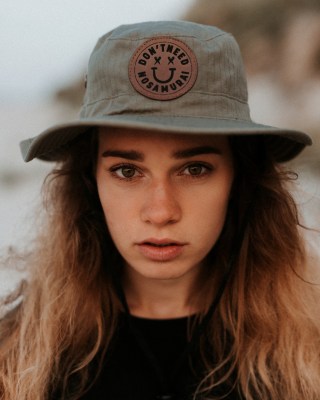 GREEN HAT SMILE